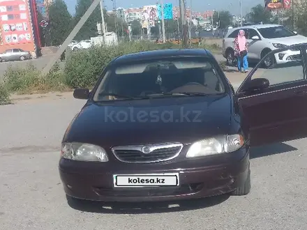 Mazda 626 1998 года за 1 500 000 тг. в Актобе – фото 2