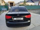 Kia Cerato 2010 года за 3 800 000 тг. в Атырау – фото 5