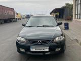 Mazda 323 2003 года за 2 200 000 тг. в Кызылорда – фото 4