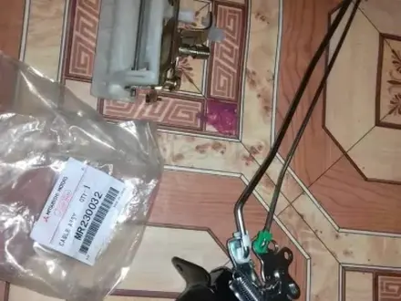 Замок багажника новые Митсубиши. за 11 000 тг. в Балхаш