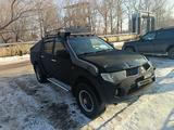 Mitsubishi L200 2008 года за 9 700 000 тг. в Караганда – фото 2