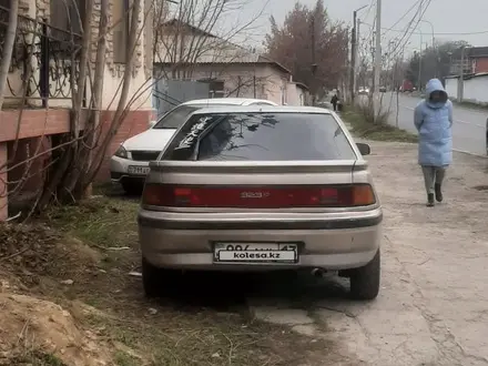 Mazda 323 1991 года за 570 000 тг. в Шымкент – фото 2