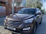 Hyundai Santa Fe 2014 года за 9 200 000 тг. в Атырау
