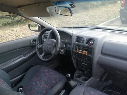 Mazda 323 1998 года за 1 650 000 тг. в Петропавловск – фото 12