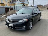 Toyota Camry 2014 года за 4 600 000 тг. в Атырау – фото 2