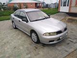 Mitsubishi Carisma 2002 годаүшін2 100 000 тг. в Актобе