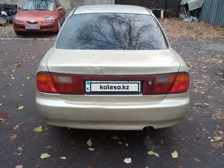 Mazda 323 1996 года за 1 100 000 тг. в Алматы – фото 4