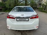 Toyota Corolla 2013 года за 7 300 000 тг. в Алматы – фото 2