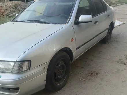 Nissan Primera 1997 года за 750 000 тг. в Атырау – фото 2