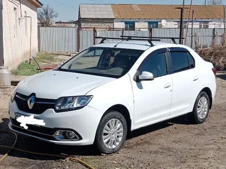 Renault Logan 2015 года за 3 000 000 тг. в Атырау – фото 2