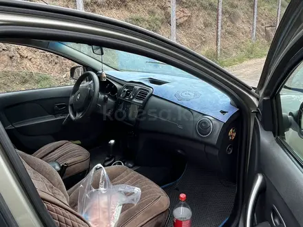 Renault Logan 2014 года за 2 500 000 тг. в Усть-Каменогорск – фото 2