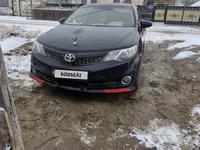 Toyota Camry 2013 года за 9 500 000 тг. в Атырау