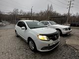 Renault Logan 2015 года за 3 500 000 тг. в Караганда – фото 3