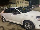 Skoda Rapid 2014 года за 2 800 000 тг. в Уральск – фото 3