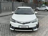 Toyota Corolla 2013 года за 6 690 000 тг. в Актобе – фото 4
