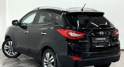 Hyundai Tucson Comfort 2.0 AT 4WD 2013 года за 6 900 000 тг. в Астана – фото 2