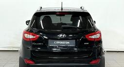 Hyundai Tucson Comfort 2.0 AT 4WD 2013 года за 6 900 000 тг. в Астана – фото 4