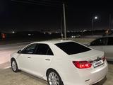 Toyota Camry 2013 года за 8 500 000 тг. в Жанаозен – фото 2