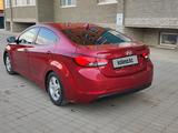 Hyundai Elantra 2015 года за 4 000 000 тг. в Актобе – фото 2