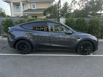 Tesla Model Y 2023 года за 19 000 000 тг. в Алматы – фото 16