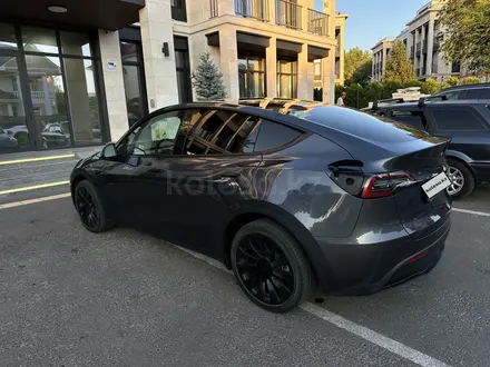 Tesla Model Y 2023 года за 19 000 000 тг. в Алматы – фото 2