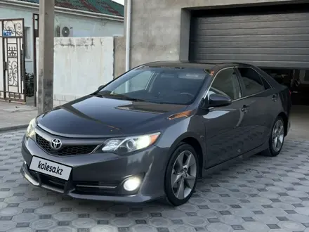 Toyota Camry 2013 года за 7 750 000 тг. в Жанаозен