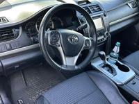 Toyota Camry 2014 года за 8 800 000 тг. в Караганда