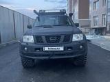 Nissan Patrol 2008 года за 12 500 000 тг. в Астана – фото 2