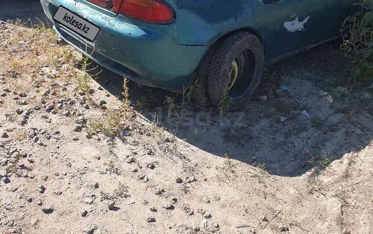 Mazda 323 1996 года за 654 321 тг. в Актобе