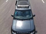 Багажник на крышу Land Rover Discovery с боковой лестницей за 495 000 тг. в Алматы – фото 2