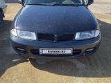 Mitsubishi Carisma 1996 годаүшін1 300 000 тг. в Актау