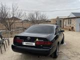 Toyota Camry 2000 года за 3 800 000 тг. в Жанаозен – фото 2