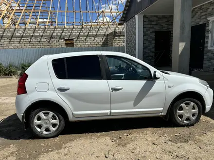 Renault Sandero 2012 года за 3 300 000 тг. в Атырау – фото 6