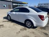 Chevrolet Aveo 2014 года за 2 700 000 тг. в Атырау – фото 3