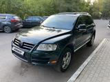 Volkswagen Touareg 2004 года за 5 500 000 тг. в Астана – фото 2
