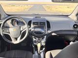 Chevrolet Aveo 2015 года за 2 400 000 тг. в Айтеке би – фото 5