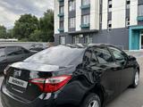 Toyota Corolla 2014 годаfor7 200 000 тг. в Алматы – фото 4