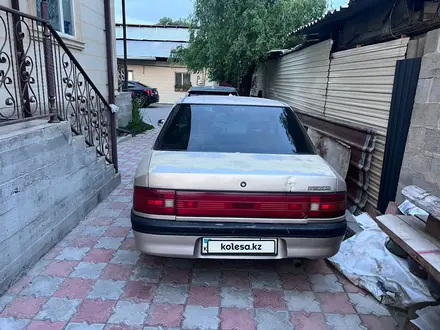 Mazda 323 1992 года за 950 000 тг. в Алматы – фото 5