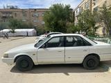 Mazda 626 1991 годаүшін600 000 тг. в Жанаозен – фото 2