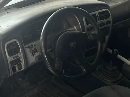 Nissan Primera 1992 года за 450 000 тг. в Шымкент – фото 4