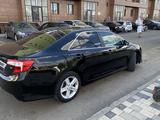 Toyota Camry 2013 года за 8 500 000 тг. в Астана – фото 2