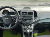 Chevrolet Aveo 2013 года за 2 600 000 тг. в Караганда – фото 4