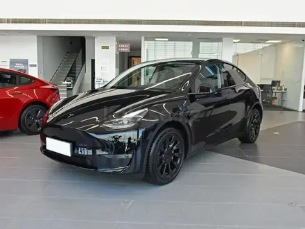 Tesla Model Y 2022 года за 28 490 000 тг. в Алматы