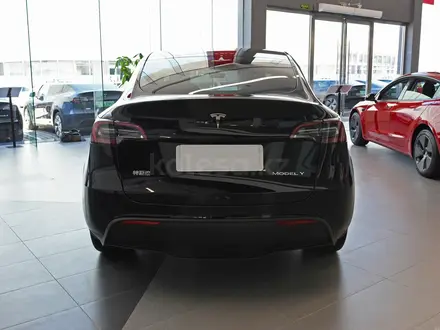 Tesla Model Y 2022 года за 28 490 000 тг. в Алматы – фото 5