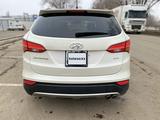 Hyundai Santa Fe 2013 годаүшін10 800 000 тг. в Уральск – фото 4