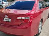 Toyota Camry 2014 года за 6 600 000 тг. в Актобе – фото 3