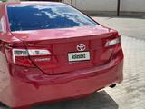 Toyota Camry 2014 года за 6 600 000 тг. в Актобе – фото 5