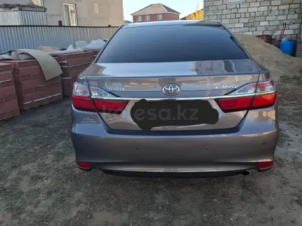 Toyota Camry 2015 года за 9 800 000 тг. в Актобе – фото 20