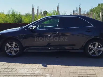 Toyota Camry 2013 года за 7 500 000 тг. в Караганда – фото 4