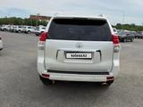 Toyota Land Cruiser Prado 2013 года за 13 800 000 тг. в Атырау – фото 4